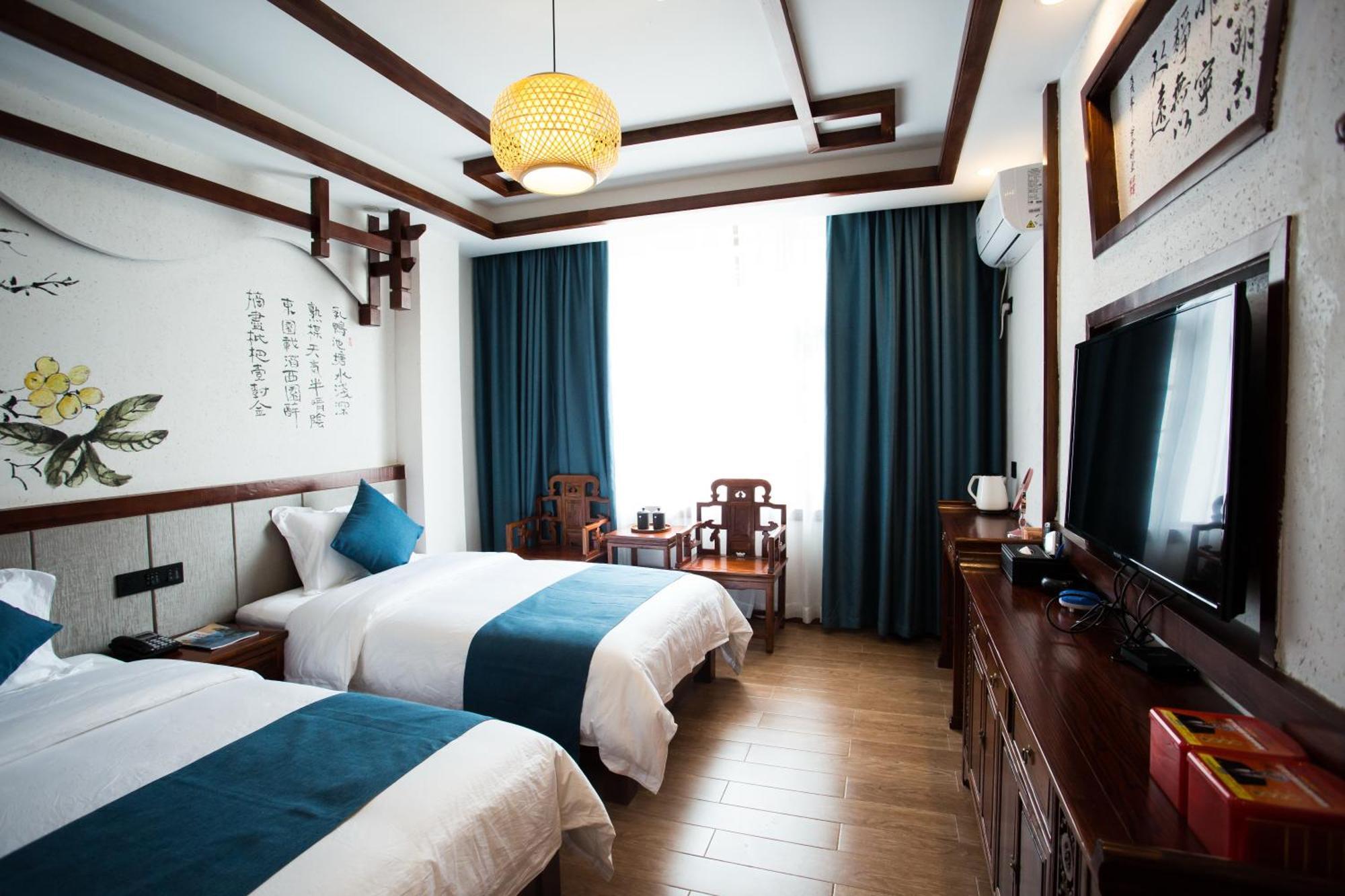 Ferienwohnung 一树一花客栈眷恋店 Wulingyuan Exterior foto